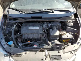 2012 Honda Insight z VIN JHMZE2H34CS003929, wystawiony jako Copart lot #52707885 z przebiegiem 131 596 mil mil oraz Szkoda całkowita • Salvage title. Historia ofert i sprzedaży dostępna na DreamBid. Obrazek 11.