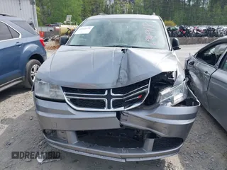 2017 Dodge Journey SE z VIN 3C4PDCAB0HT694918, wystawiony jako IAAI lot #42010594 z przebiegiem 135 432 mil mil oraz . Historia ofert i sprzedaży dostępna na DreamBid. Obrazek 12.