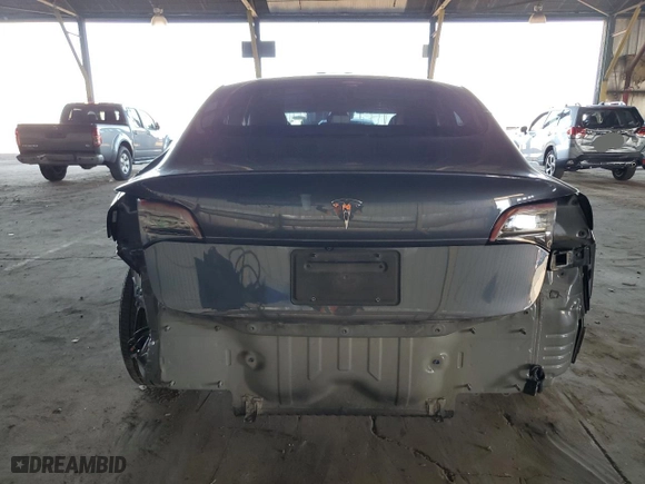 2020 Tesla Model 3 Standard Range Plus with VIN 5YJ3E1EA7LF614913, listed as a Copart auction lot 48518555 with 121,482 mi miles and Salvage Title. Bid and sale history available at carsss.com. Image 6.