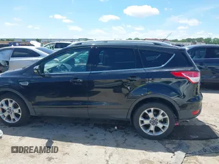 2015 Ford Escape Titanium with VIN 1FMCU0JX3FUB39808, listed as a IAAI auction lot 42212271 with 136,488 mi miles and . Bid and sale history available at DreamBid. Image 15.