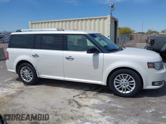 2015 Ford Flex SEL with VIN 2FMHK6C85FBA09233, listed as a IAAI auction lot 42142972 with 221,909 mi miles. Bid and sale history available at carsss.com. Image 13.