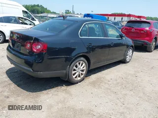 2010 Volkswagen Jetta SE z VIN 3VWRZ7AJ9AM042787, wystawiony jako IAAI lot #42466773 z przebiegiem 144 829 mil mil oraz . Historia ofert i sprzedaży dostępna na DreamBid. Obrazek 4.