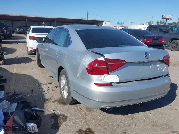 2016 Volkswagen Passat 1.8T S with VIN 1VWAS7A36GC032067, listed as a IAAI auction lot 41207782 with 123,651 mi miles. Bid and sale history available at carsss.com. Image 3.