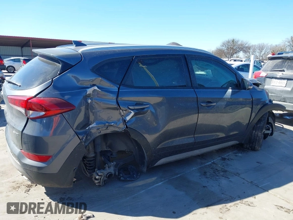 2018 Hyundai Tucson Sport with VIN KM8J33AL5JU770092, listed as a IAAI auction lot 41395349 with 101,395 mi miles. Bid and sale history available at carsss.com. Image 6.