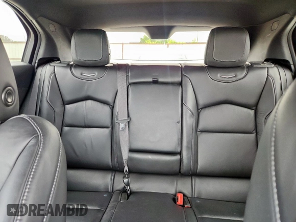 2020 Cadillac XT4 FWD Premium Luxury with VIN 1GYFZCR40LF073517, listed as a Copart auction lot 60121635 with 79,450 mi miles and Salvage title. Bid and sale history available at DreamBid. Image 10.