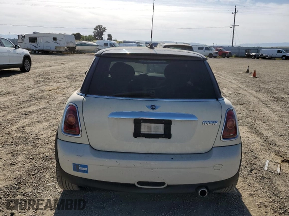 2010 MINI Hardtop with VIN WMWMF3C5XATZ66863, listed as a Copart auction lot 55695585 with 59,294 mi miles and Clean Title. Bid and sale history available at DreamBid. Image 6.