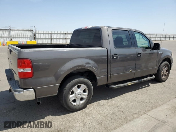 2004 Ford F-150 XLT with VIN 1FTRW12W74KC26169, listed as a Copart auction lot 68393914 with 118,059 mi miles and Salvage Title. Bid and sale history available at DreamBid. Image 3.
