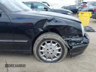 2001 Mercedes-Benz E 320 with VIN WDBJF65J91B363439, listed as a IAAI auction lot 42058536 with 61,272 mi miles and . Bid and sale history available at DreamBid. Image 17.
