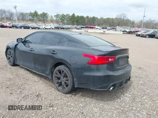 2016 Nissan Maxima SL with VIN 1N4AA6APXGC420735, listed as a IAAI auction lot 41972436 with 148,140 mi miles and . Bid and sale history available at DreamBid. Image 3.