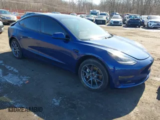 2023 Tesla Model 3 Long Range z VIN 5YJ3E1EB2PF602781, wystawiony jako IAAI lot #41628207 z przebiegiem 30 622 mil mil oraz . Historia ofert i sprzedaży dostępna na DreamBid. Obrazek 1.