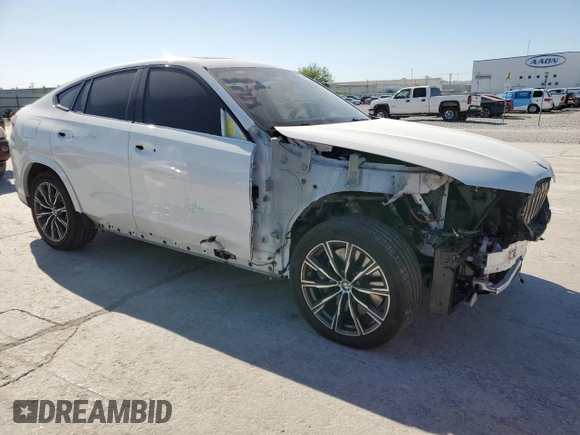 2020 BMW X6 xDrive40i z VIN 5UXCY6C00L9D45082, wystawiony jako Copart lot #52588665 z przebiegiem 40 810 mil mil oraz Szkoda całkowita • Salvage title. Historia ofert i sprzedaży dostępna na DreamBid. Obrazek 4.