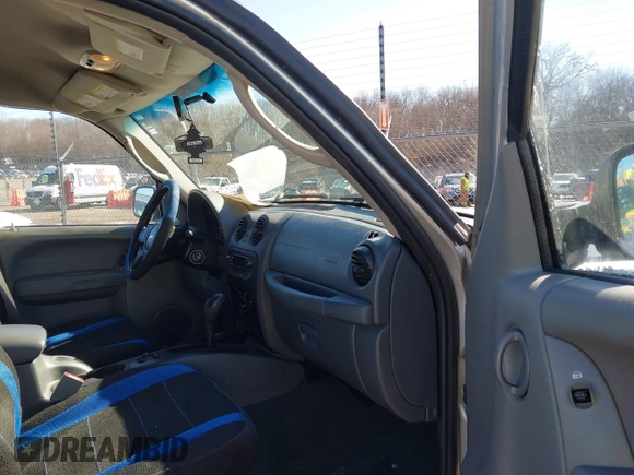 2005 Jeep Liberty Sport with VIN 1J4GL48K25W571751, listed as a IAAI auction lot 41735123 with 145,478 mi miles and . Bid and sale history available at DreamBid. Image 5.