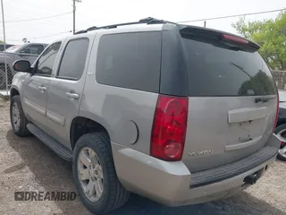 2007 GMC Yukon SLT with VIN 1GKFK13007J115065, listed as a IAAI auction lot 41837778 with 234,917 mi miles. Bid and sale history available at carsss.com. Image 3.