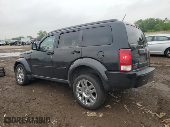 2011 Dodge Nitro Heat with VIN 1D4PT4GK7BW597557, listed as a Copart auction lot 58973335 with 180,958 mi miles and Salvage title. Bid and sale history available at DreamBid. Image 2.