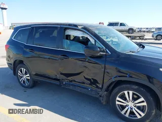2017 Honda Pilot EX-L with VIN 5FNYF6H54HB024349, listed as a IAAI auction lot 42082517 with 108,000 mi miles and . Bid and sale history available at DreamBid. Image 6.