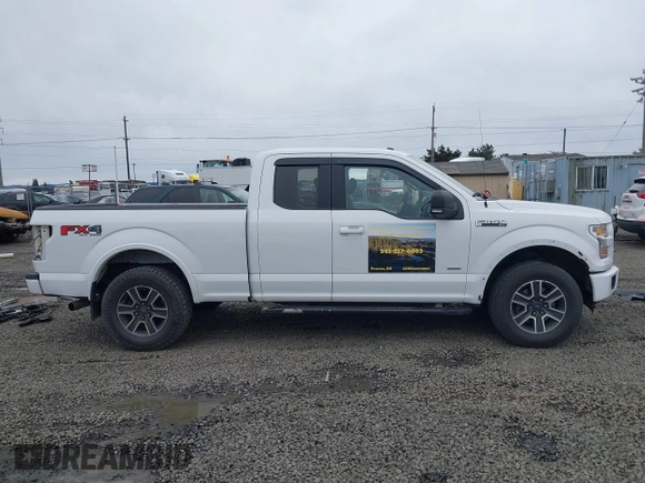 2015 Ford F-150 XLT with VIN 1FTEX1EP1FFA21653, listed as a IAAI auction lot 41597518 with 153,111 mi miles and . Bid and sale history available at DreamBid. Image 14.