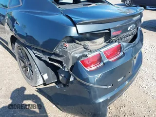 2013 Chevrolet Camaro LS z VIN 2G1FA1E35D9156989, wystawiony jako IAAI lot #41999082 z przebiegiem 168 616 mil mil oraz . Historia ofert i sprzedaży dostępna na DreamBid. Obrazek 19.