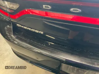 2019 Dodge Charger SXT z VIN 2C3CDXBG6KH613859, wystawiony jako IAAI lot #42509609 z przebiegiem 76 418 mil mil oraz . Historia ofert i sprzedaży dostępna na DreamBid. Obrazek 24.