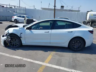 2025 Tesla Model 3 Long Range with VIN 5YJ3E1EA4SF903567, listed as a IAAI auction lot 42453246 with 19,365 mi miles and . Bid and sale history available at DreamBid. Image 15.