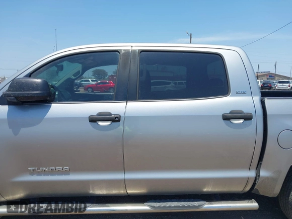 2014 Toyota Tundra SR5 z VIN 5TFEM5F15EX068560, wystawiony jako IAAI lot #42265351 z przebiegiem 163 294 mil mil oraz . Historia ofert i sprzedaży dostępna na DreamBid. Obrazek 14.