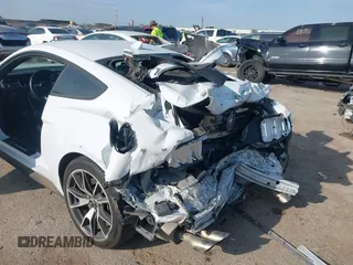 2021 Ford Mustang EcoBoost z VIN 1FA6P8TD5M5133239, wystawiony jako IAAI lot #41899042 z przebiegiem 65 553 mil mil oraz . Historia ofert i sprzedaży dostępna na DreamBid. Obrazek 6.