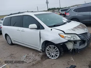 2014 Toyota Sienna XLE with VIN 5TDYK3DC5ES437127, listed as a IAAI auction lot 41561709 with 119,514 mi miles. Bid and sale history available at carsss.com. Image 1.