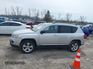 2012 Jeep Compass Sport with VIN 1C4NJDBB4CD624163, listed as a IAAI auction lot 42025783 with 148,928 mi miles. Bid and sale history available at carsss.com. Image 14.