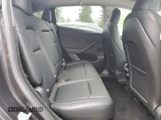 2025 Tesla Model Y Long Range with VIN 7SAYGDEE5SF296652, listed as a Copart auction lot 46664465 with 452 mi miles and Salvage Title. Bid and sale history available at DreamBid. Image 11.