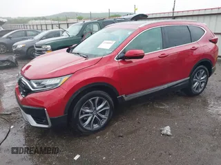 2021 Honda CR-V Touring with VIN 2HKRW2H9XMH663315, listed as a IAAI auction lot 42188893 with 26,203 mi miles and . Bid and sale history available at DreamBid. Image 2.