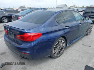 2018 BMW 5 Series M550i xDrive with VIN WBAJB9C59JB049436, listed as a IAAI auction lot 42126762 with 126,684 mi miles and . Bid and sale history available at DreamBid. Image 4.