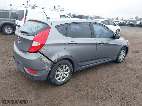 2014 Hyundai Accent GS with VIN KMHCT5AE3EU176306, listed as a IAAI auction lot 41572325 with 179,277 mi miles. Bid and sale history available at carsss.com. Image 4.