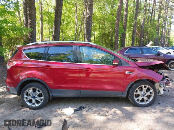 2014 Ford Escape Titanium with VIN 1FMCU9JX7EUB68165, listed as a IAAI auction lot 42141235 with 172,041 mi miles and . Bid and sale history available at DreamBid. Image 14.