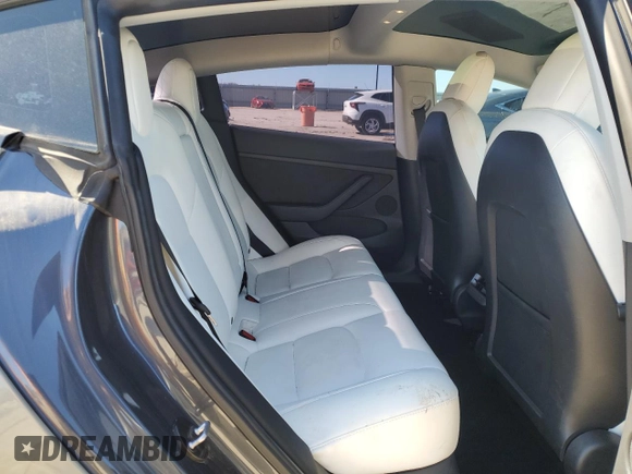 2022 Tesla Model 3 z VIN 5YJ3E1EA5NF124425, wystawiony jako Copart lot #43804405 z przebiegiem 57 412 mil mil oraz Szkoda całkowita • Salvage title. Historia ofert i sprzedaży dostępna na DreamBid. Obrazek 11.