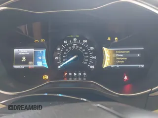 2014 Ford Fusion SE with VIN 3FA6P0HD8ER372731, listed as a IAAI auction lot 39915643 with 136,635 mi miles and . Bid and sale history available at DreamBid. Image 7.