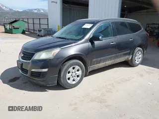 2015 Chevrolet Traverse LS z VIN 1GNKVFED4FJ323888, wystawiony jako IAAI lot #42001827 z przebiegiem 182 819 mil mil oraz . Historia ofert i sprzedaży dostępna na DreamBid. Obrazek 2.