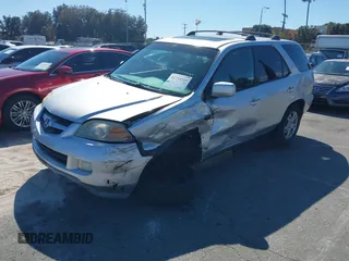 2005 Acura MDX Touring with VIN 2HNYD18955H558360, listed as a IAAI auction lot 41738503 with 153,461 mi miles. Bid and sale history available at carsss.com. Image 2.