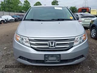 2011 Honda Odyssey LX with VIN 5FNRL5H25BB040287, listed as a IAAI auction lot 42456679 with 129,176 mi miles and . Bid and sale history available at DreamBid. Image 12.