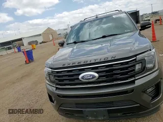 2021 Ford Expedition Limited z VIN 1FMJU2AT1MEA16614, wystawiony jako Copart lot #62007215 z przebiegiem 32 995 mil mil oraz Szkoda całkowita • Salvage title. Historia ofert i sprzedaży dostępna na DreamBid. Obrazek 14.