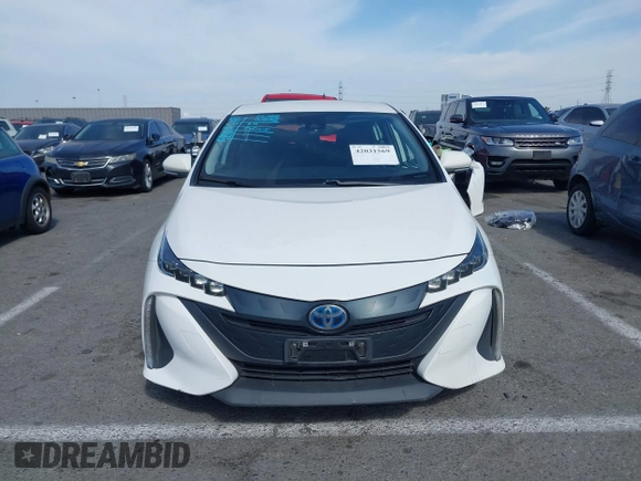 2021 Toyota Prius LE with VIN JTDKAMFP7M3197111, listed as a IAAI auction lot 42031569 with 240,098 mi miles and . Bid and sale history available at DreamBid. Image 13.