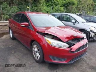 2015 Ford Focus SE with VIN 1FADP3F22FL259223, listed as a IAAI auction lot 42333439 with 77,111 mi miles and . Bid and sale history available at DreamBid. Image 1.
