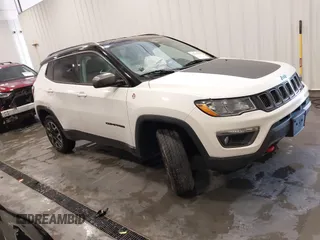 2020 Jeep Compass Trailhawk z VIN 3C4NJDDB9LT220878, wystawiony jako IAAI lot #42139615 z przebiegiem 64 094 mil mil oraz . Historia ofert i sprzedaży dostępna na DreamBid. Obrazek 1.