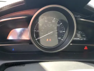 2018 Mazda CX-3 Touring z VIN JM1DKFC74J0312864, wystawiony jako Copart lot #55862845 z przebiegiem 75 584 mil mil oraz Szkoda całkowita • Salvage title. Historia ofert i sprzedaży dostępna na DreamBid. Obrazek 9.