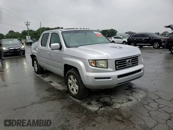 2006 Honda Ridgeline RTL z VIN 2HJYK16546H544183, wystawiony jako Copart lot #57426655 z przebiegiem 162 878 mil mil oraz Szkoda całkowita • Salvage title. Historia ofert i sprzedaży dostępna na DreamBid. Obrazek 13.