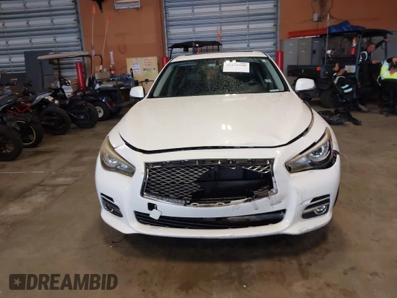 2014 Infiniti Q50 Premium z VIN JN1BV7AP0EM679026, wystawiony jako IAAI lot #42225108 z przebiegiem 96 656 mil mil oraz . Historia ofert i sprzedaży dostępna na DreamBid. Obrazek 6.