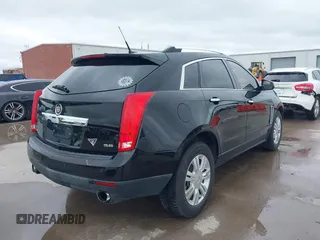 2013 Cadillac SRX Luxury Collection z VIN 3GYFNCE33DS506348, wystawiony jako IAAI lot #42202002 z przebiegiem 117 216 mil mil oraz . Historia ofert i sprzedaży dostępna na DreamBid. Obrazek 4.