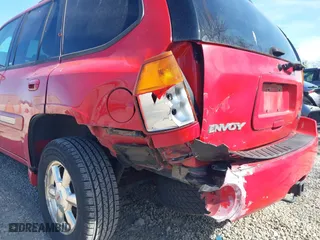 2002 GMC Envoy SLT with VIN 1GKDT13S322512505, listed as a IAAI auction lot 42056266 with 139,793 mi miles. Bid and sale history available at carsss.com. Image 6.