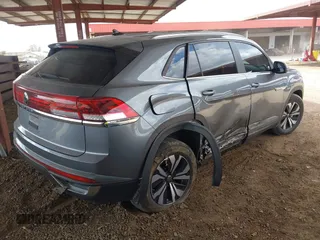 2024 Volkswagen Atlas SE with VIN 1V2DE2CA0RC250660, listed as a IAAI auction lot 42085431 with 14,268 mi miles and . Bid and sale history available at DreamBid. Image 4.