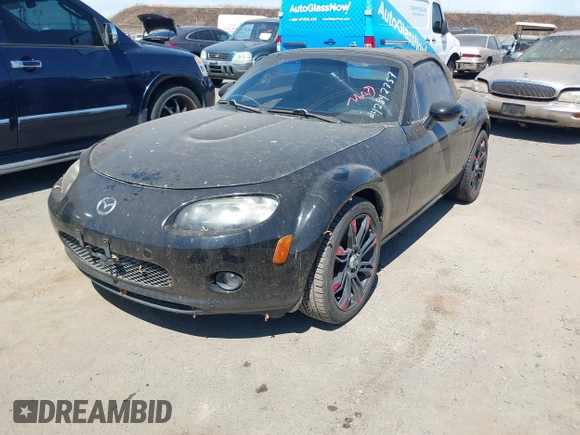 2006 Mazda MX-5 Miata Sport with VIN JM1NC25F860115878, listed as a IAAI auction lot 42842757 with 81,777 mi miles and . Bid and sale history available at DreamBid. Image 2.