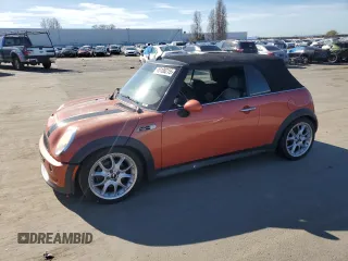 2006 MINI Convertible S with VIN WMWRH33506TK57933, listed as a Copart auction lot 46188215 with 121,000 mi miles and Salvage Title. Bid and sale history available at DreamBid. Image 1.