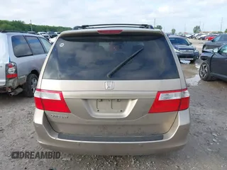 2006 Honda Odyssey EX-L z VIN 5FNRL38756B458936, wystawiony jako IAAI lot #42201902 z przebiegiem 339 976 mil mil oraz . Historia ofert i sprzedaży dostępna na DreamBid. Obrazek 16.